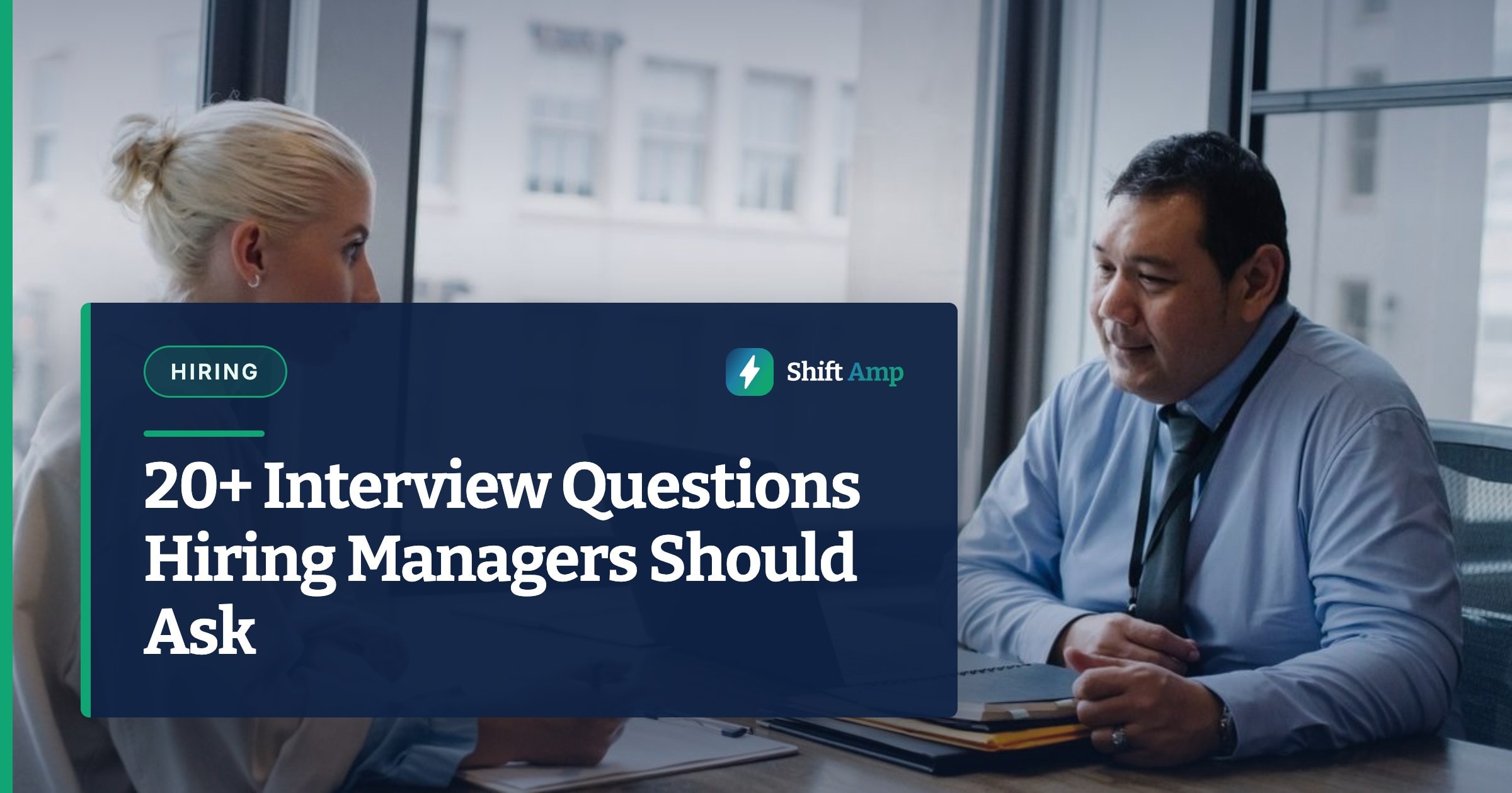 Ethnic boss asking question to female candidate filling information form on clipboard during hiring meeting