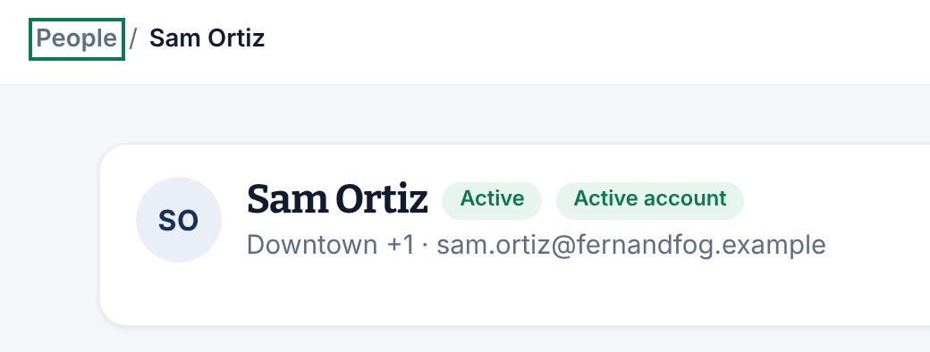 The top of a person's record, with the People link above the person's name outlined.