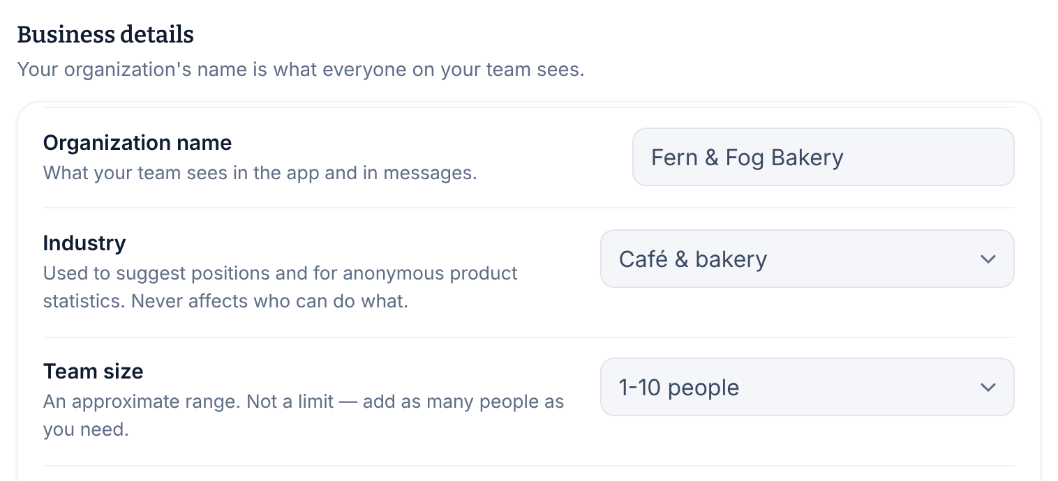 The Business details section of the Organization settings, showing the organization name Fern & Fog Bakery, the industry Café & bakery and the team size 1-10 people.